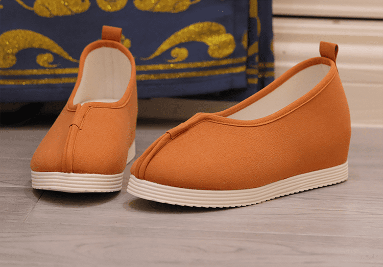 Orange traditional Chinese shoes for women in Qing dynasty