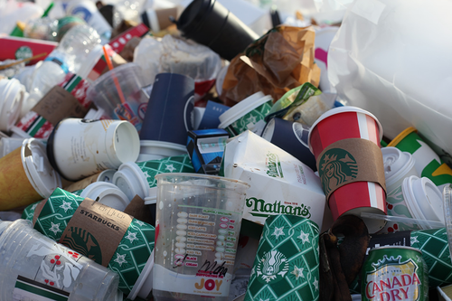 Pile of disposable cups and other food packaging