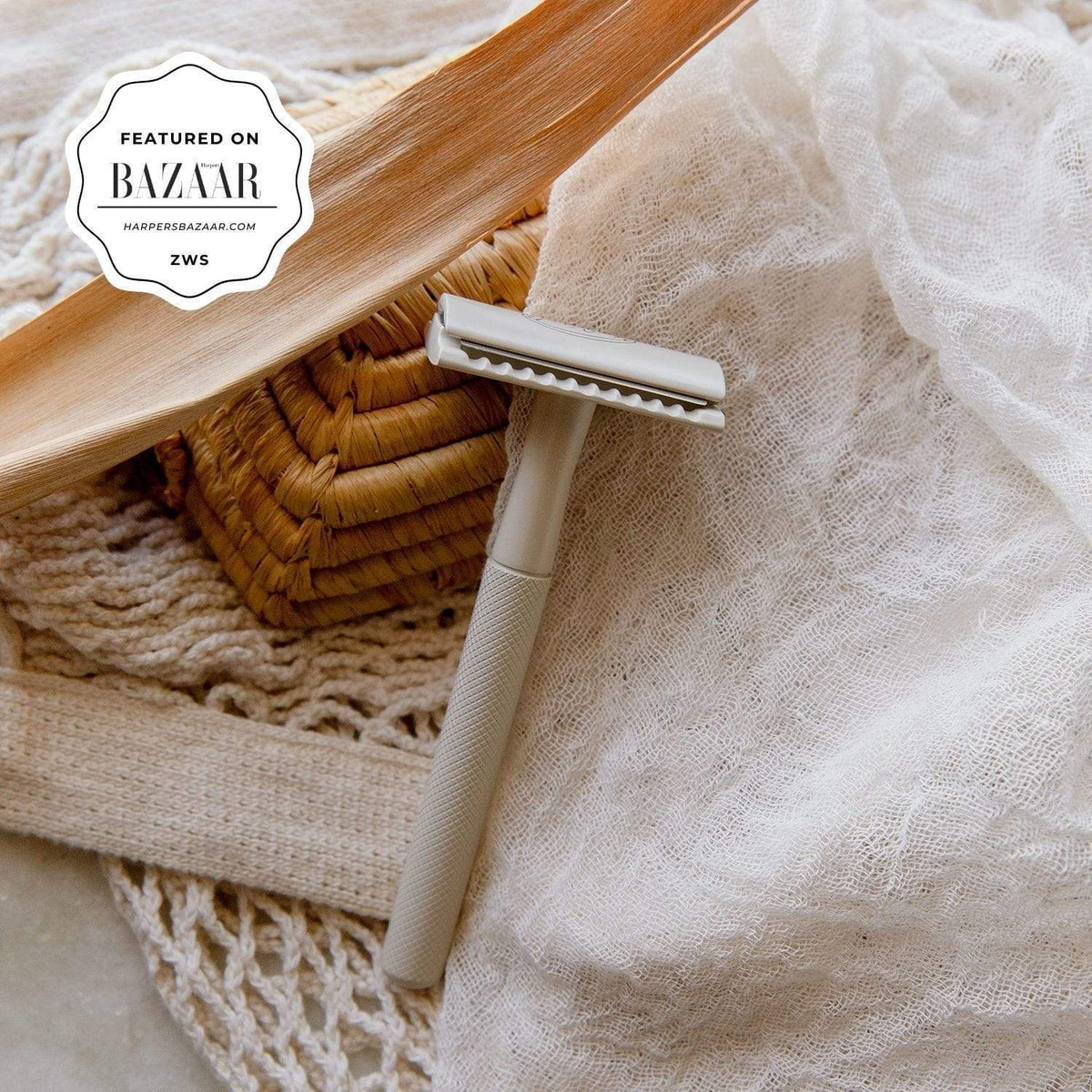 Grey safety razor from Upcircle Beauty. Sticker reads: Featured on BAZAAR