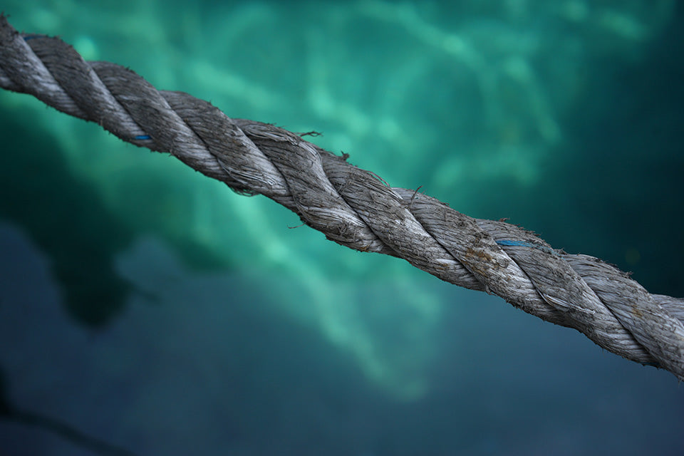 Rope stretched above water made from nylon, polyester, and polypropylene