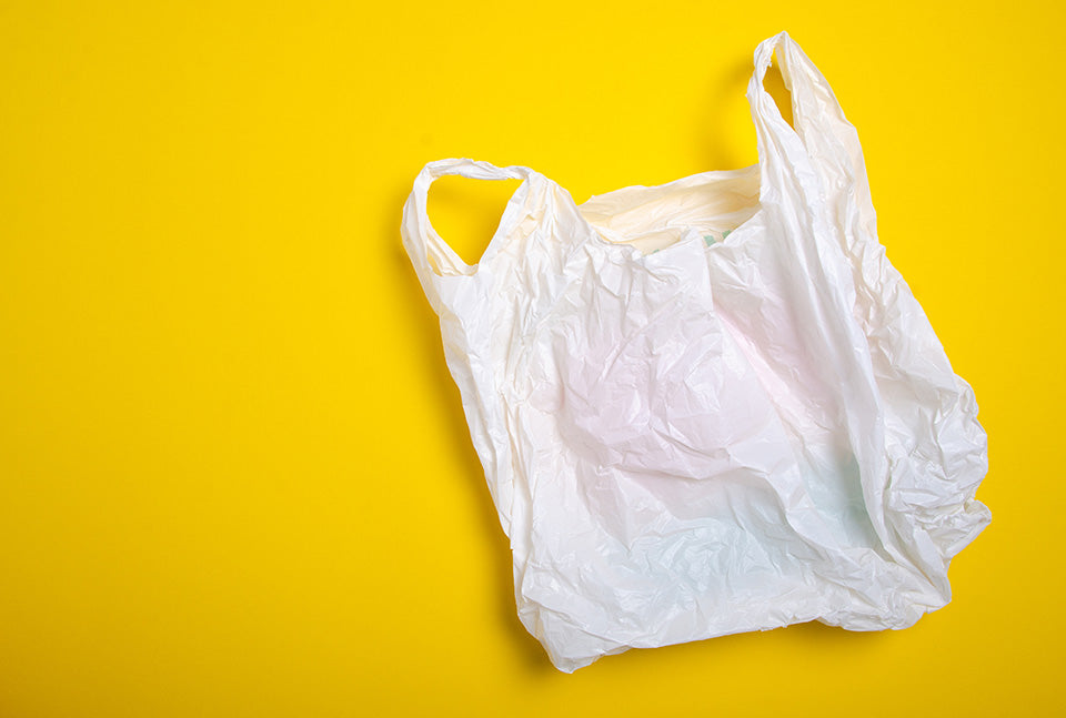 plastic shopping bag on a yellow background