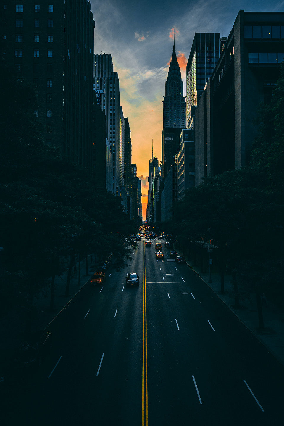 Manhattan skyscrapers at sunset without any lights on inside