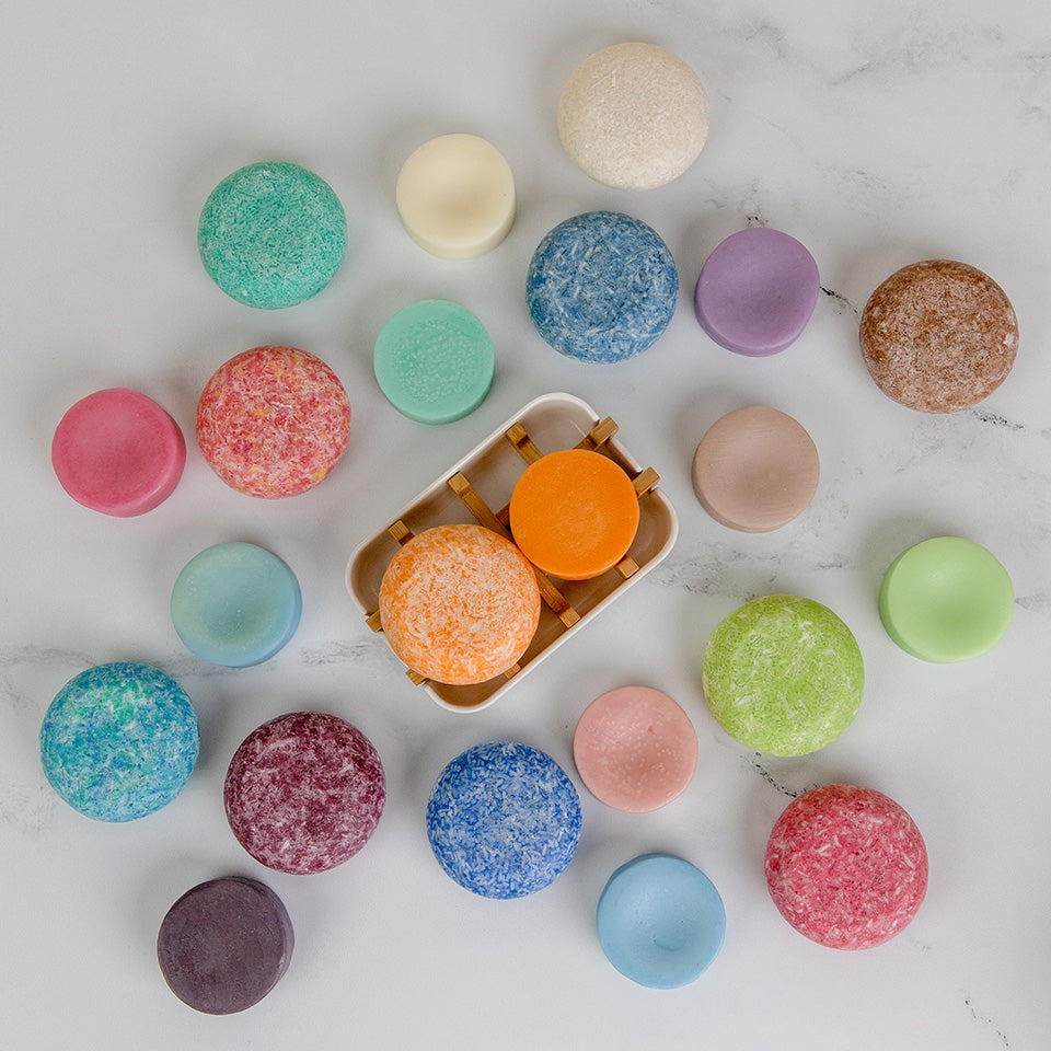 Colorful round shampoo and conditioner bars