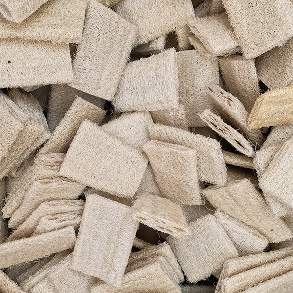 A detail of a pile of natural loofah scrubbers