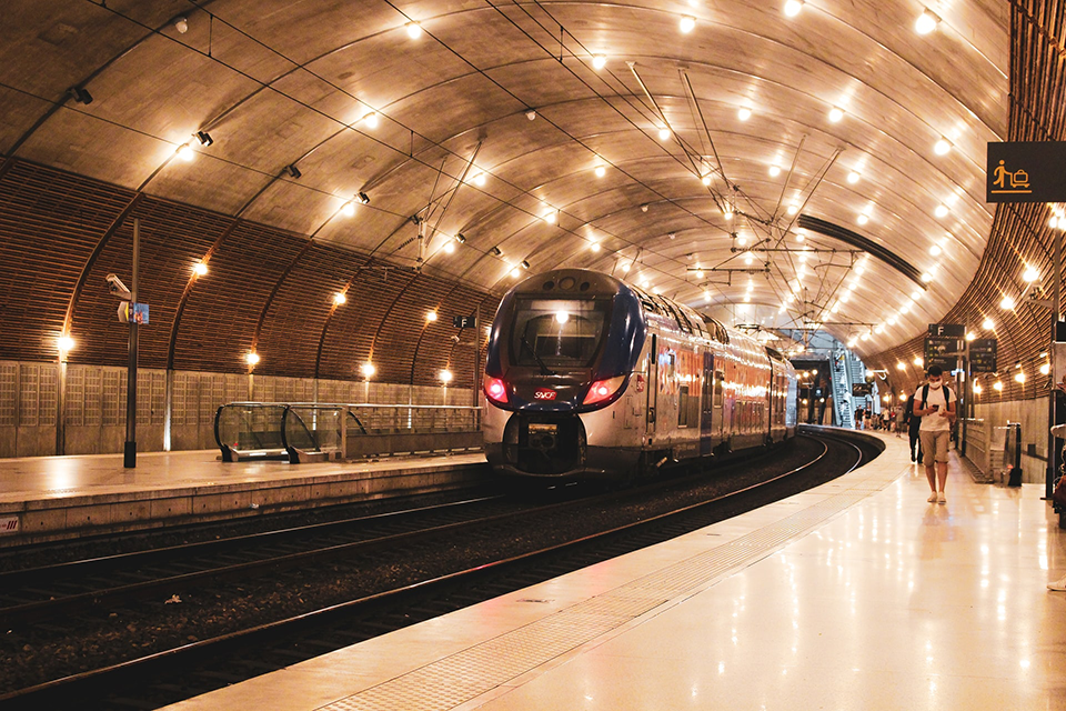 train pulling into indoor station