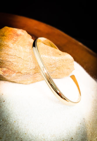 Wide Cuff Bracelet in 18K Yellow Gold with a Hand Engraved Edge – Caleb  Meyer Studio