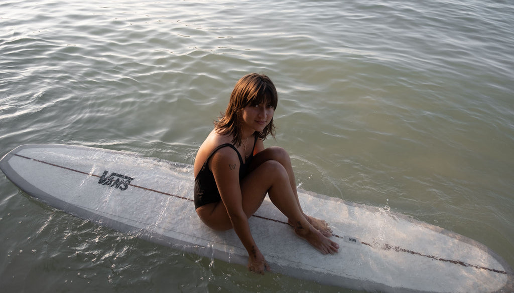 Lola on longboard