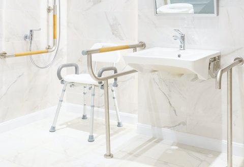 shower chairs in an accessible bathroom