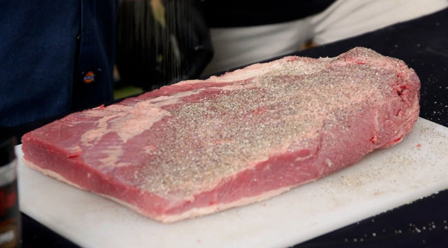 Seasoning the brisket with layers of flavor