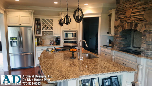 The stacked stone range hood demands attention as your enter this dream kitchen. The large kitchen island provides ample space for cooking, entertaining, and family eating.