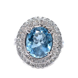 blue topaz and diamond double halo ring