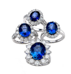 white gold blue sapphire and diamond halo rings