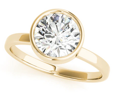 yellow gold bezel set solitaire diamond engagement ring 