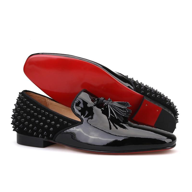 black dress shoes with red soles