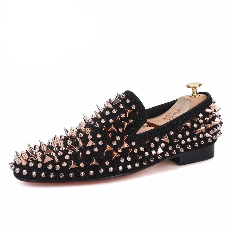 black and gold spiked loafers