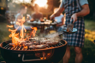 man-cooking-food-barbecue-grill-while-family-enjoying-meal-background-yard_960396-558937.jpg__PID:cc56fd62-bf3c-472c-a573-4beb7a4a4134