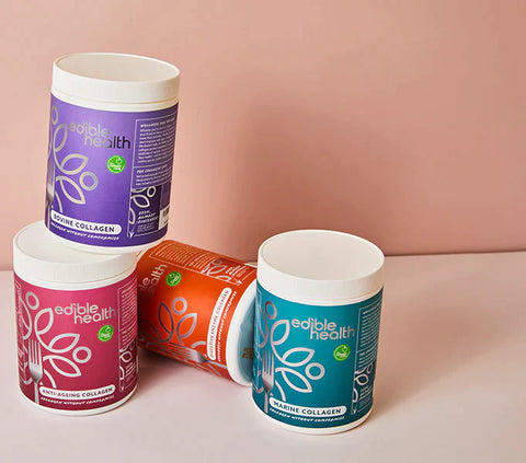 Four 500g tubs of Edible Health collagen products - Bovine Collagen in purple branding, Marine Collagen in green branding, Anti-Ageing Collagen in raspberry branding and Digestive Enzyme Collagen in orange branding