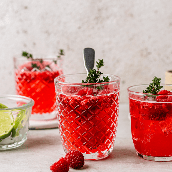 raspberry collagen spritzer with lemon and thyme