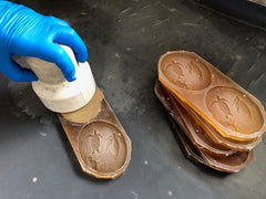 Filling sand into molds