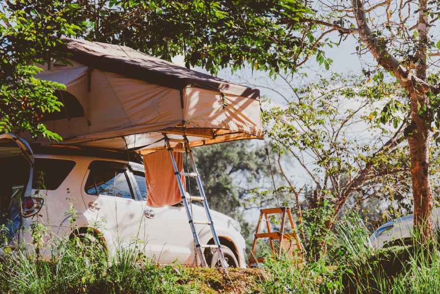 SUV with a truck rack tent