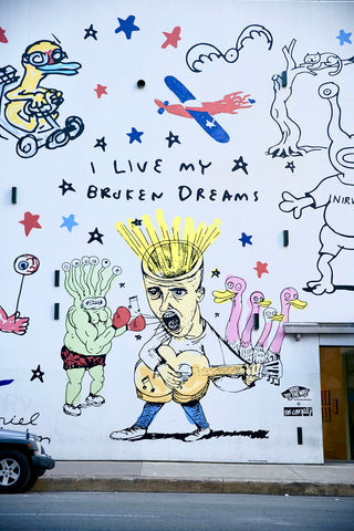 No-Comply Skateshop in Austin, TX sponsored mural of Daniel Johnston artworks for I Live My Broken Dreams at The Contemporary Austin