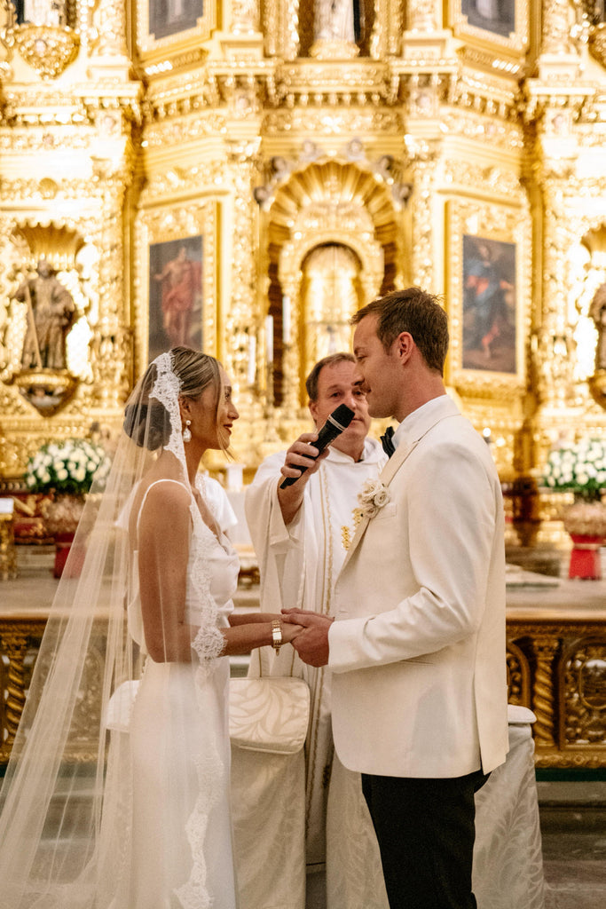 Oaxaca Mexico wedding in cathedral with bride in long lace mantilla bridal veil