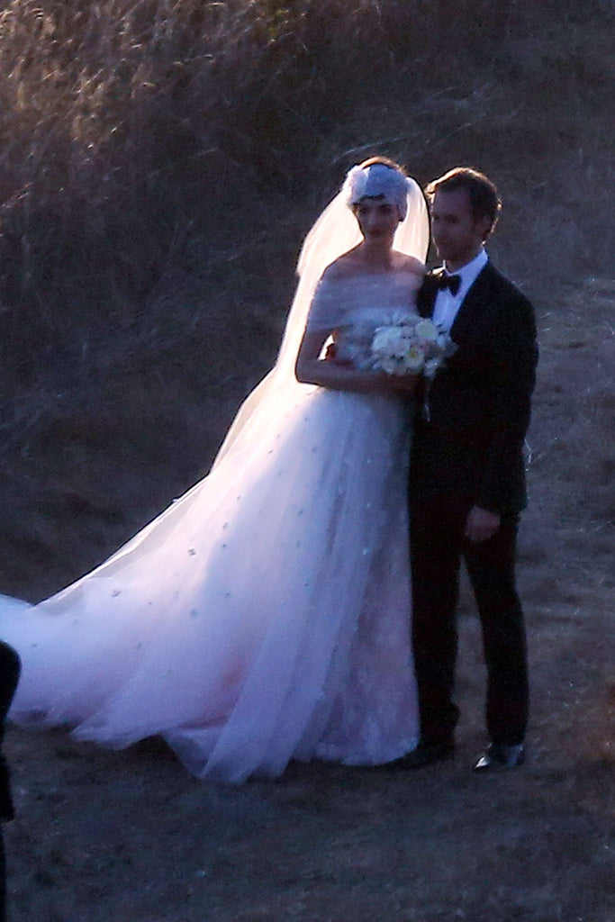 vintage inspired stretch lace headband and long veil on Anne Hathaway's wedding day