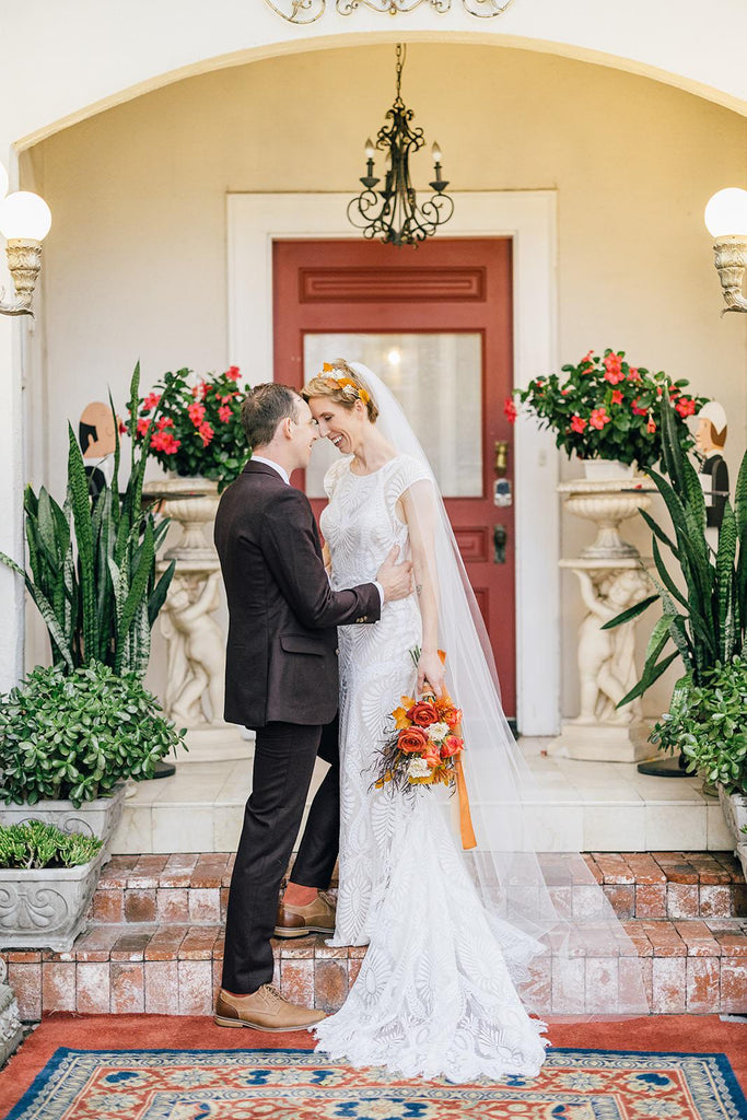 rust inspired autumn wedding look with leaf hairpiece crown and long thin wedding veil for mature brides