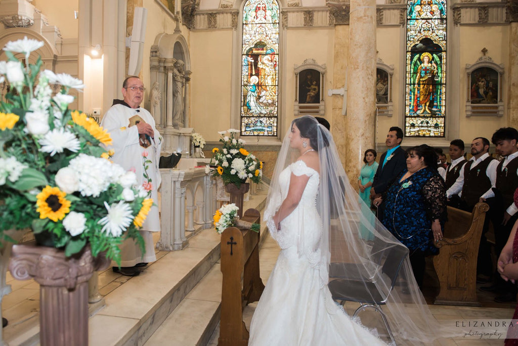 drop full lace cathedral wedding veil in church