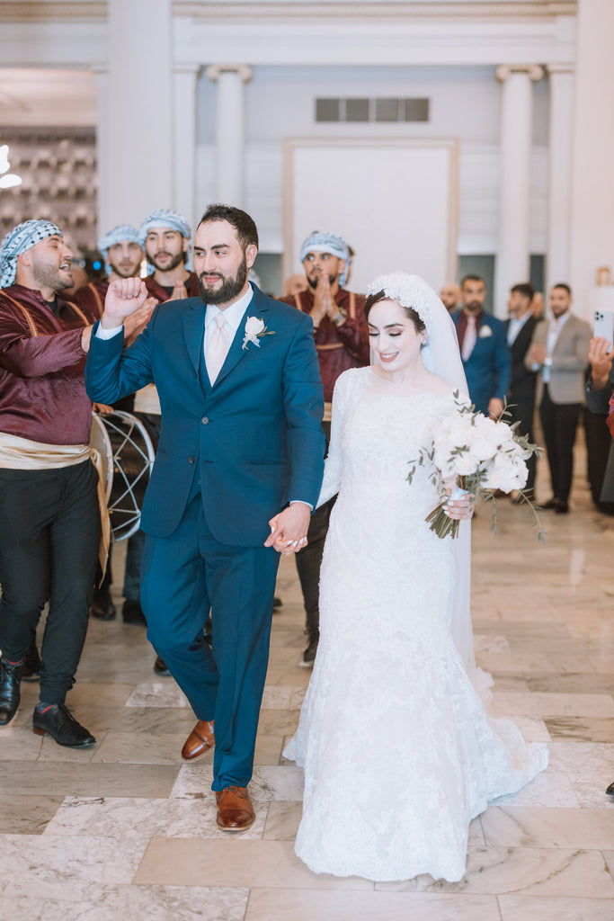 traditional middle eastern wedding with long cathedral veil with hijabi wedding hat