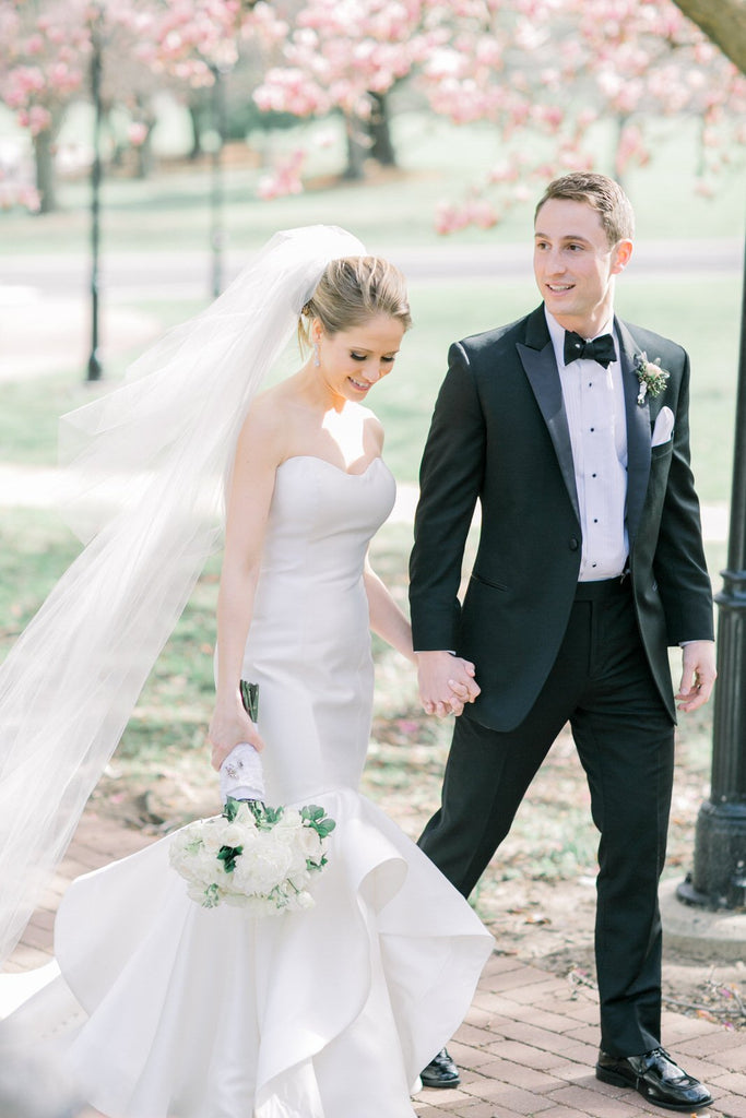 two layer wedding veil with blusher on top of low updo