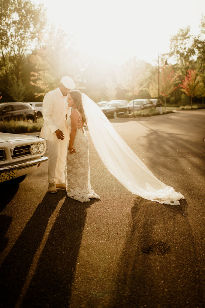 lace long wedding veil with bridal gown without dress train