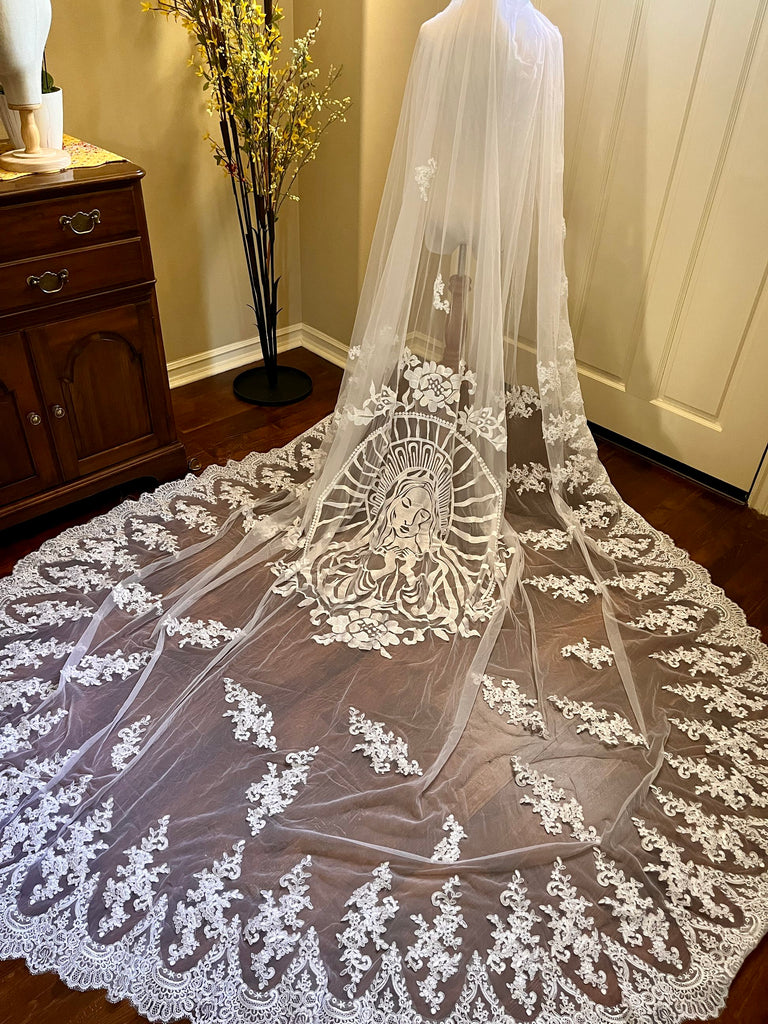 Virgin Mary wedding veil with lace trim in cathedral length