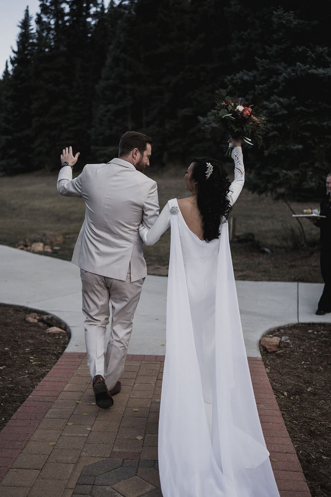 flam curled waves in bride's hair and draped cape veil in vintage chiffon fabric from mom's old wedding dress