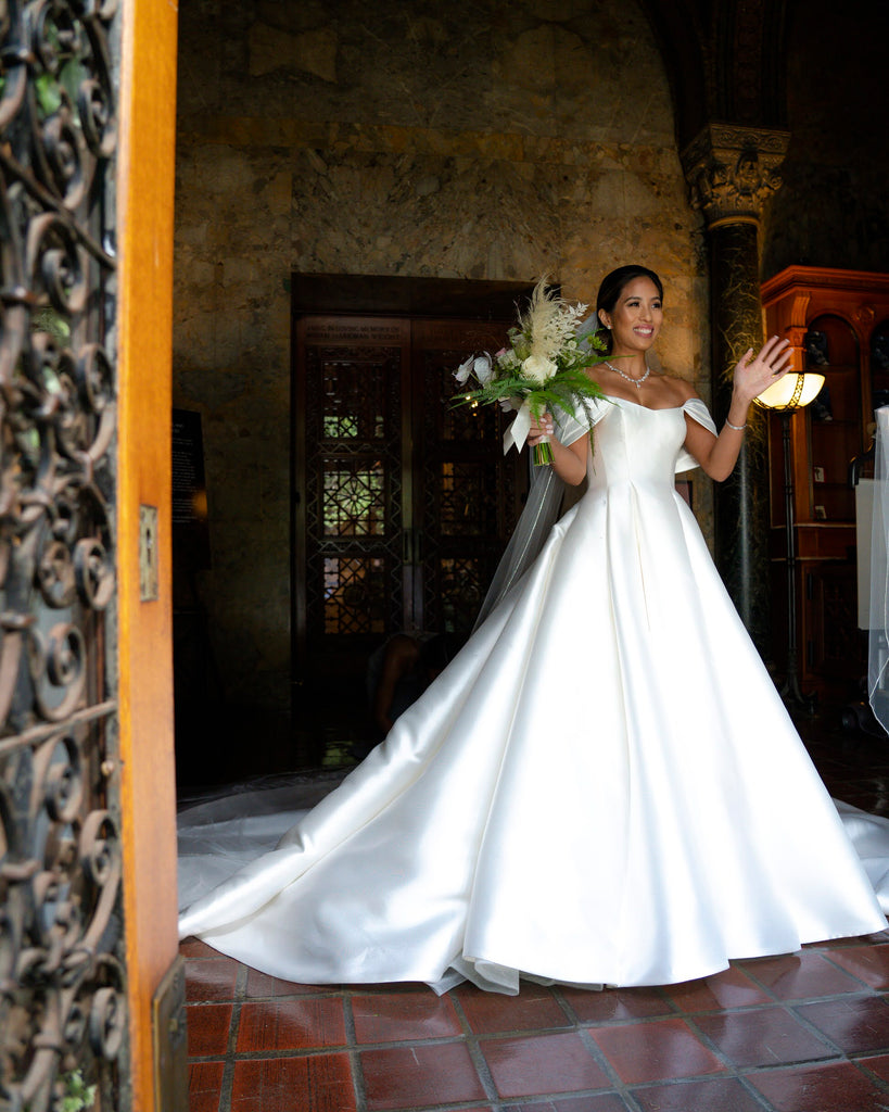 ballgown satin wedding dress with rhinestone bridal veil and elegant updo