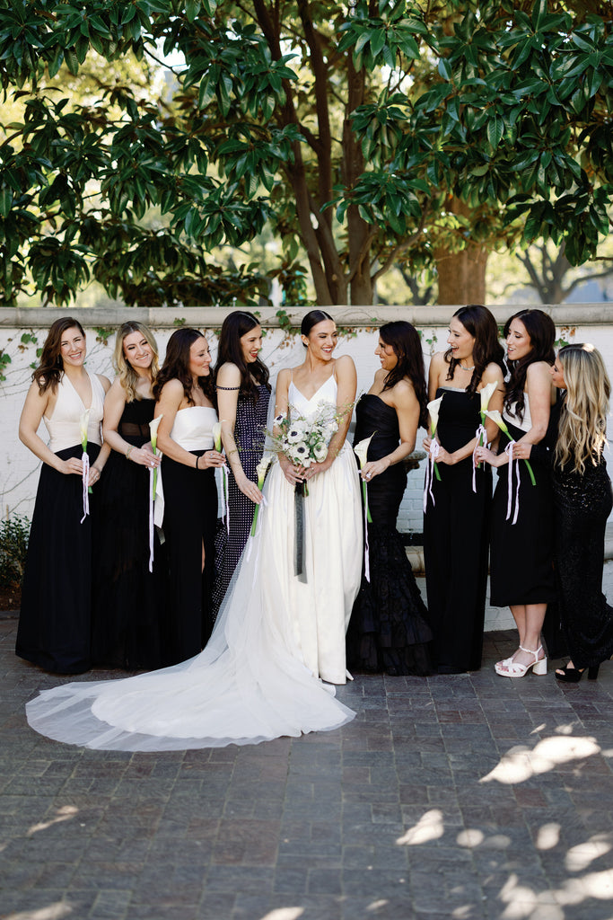 black and white colored wedding with bride in drop waist ballgown and silk drop wedding veil from one blushing bride