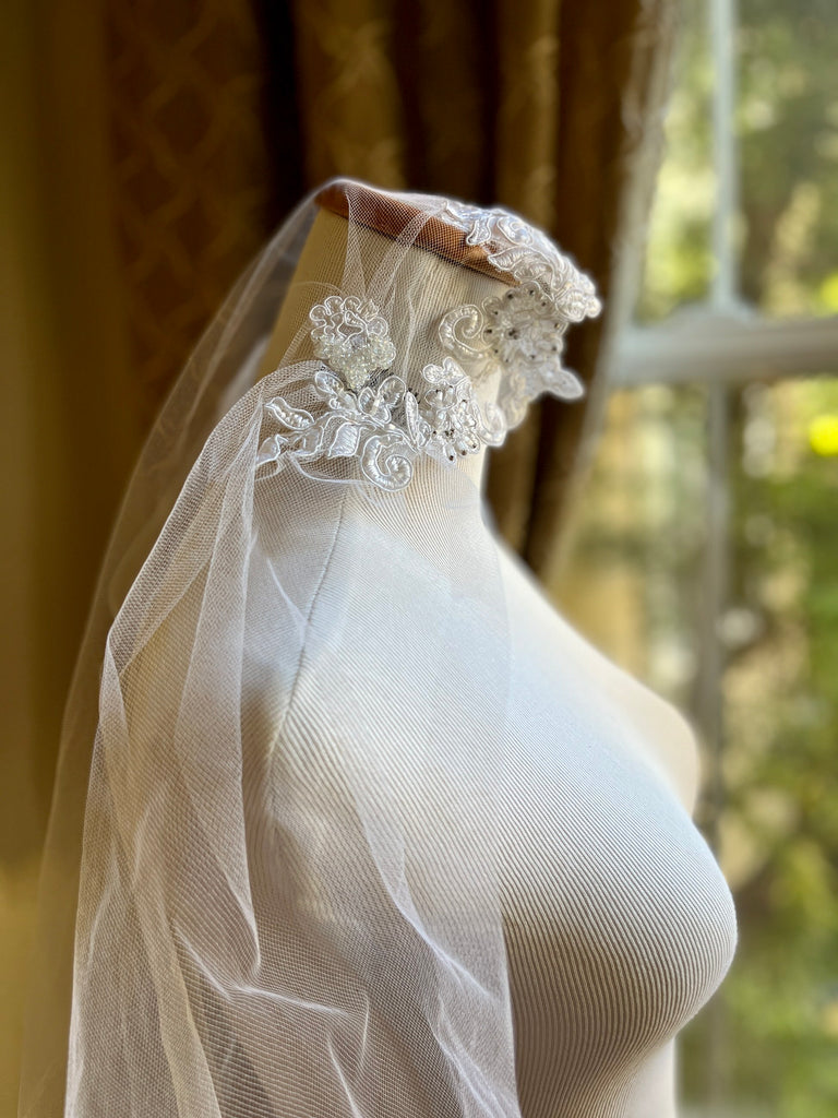 Juliet cap lace wedding veil on mannequin