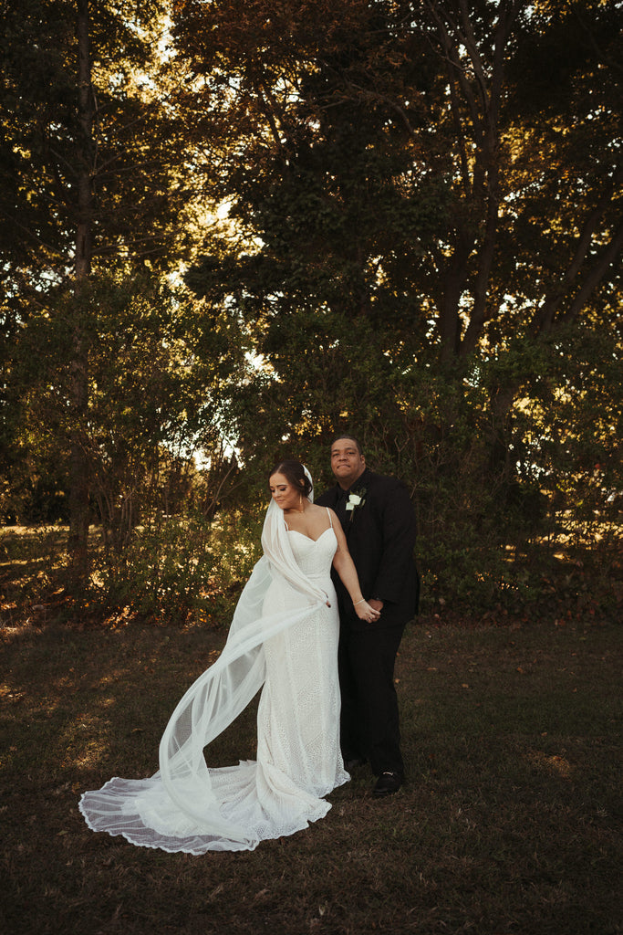 long chapel length bridal veil in Swiss polka dot tulle and scalloped lace edge trimming