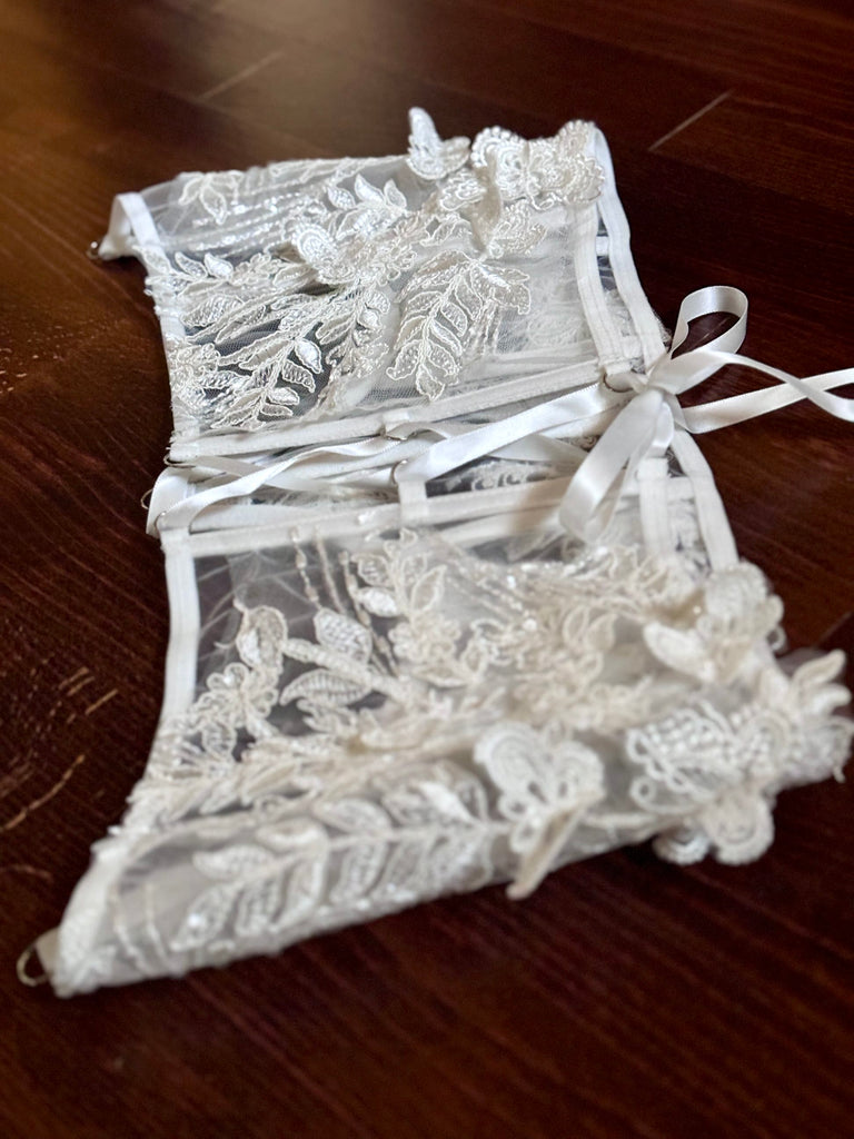 white butterfly lace on wedding corset with ribbon ties