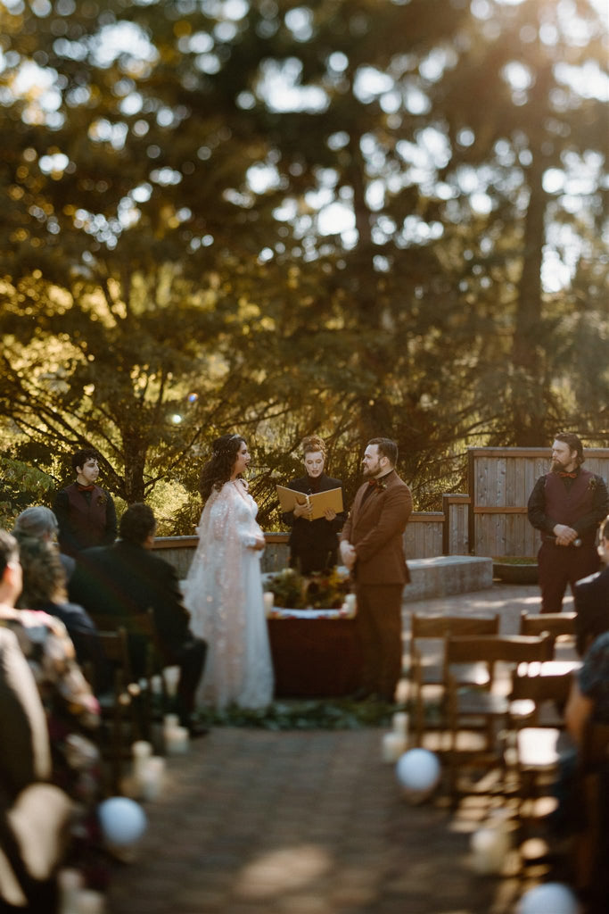 woodland forest grove wedding with romantic gothic ceremony decor