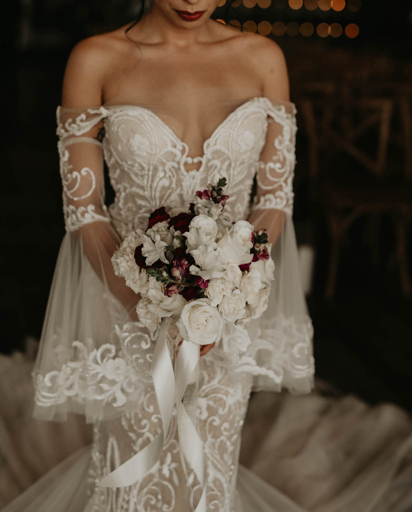 removable elven style bridal sleeves with lace on bride in sweetheart neckline gown