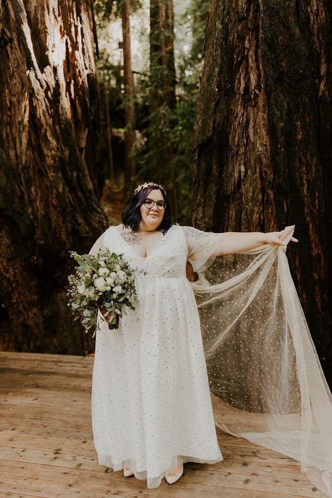 gold cape veil on plus size bride in star headband