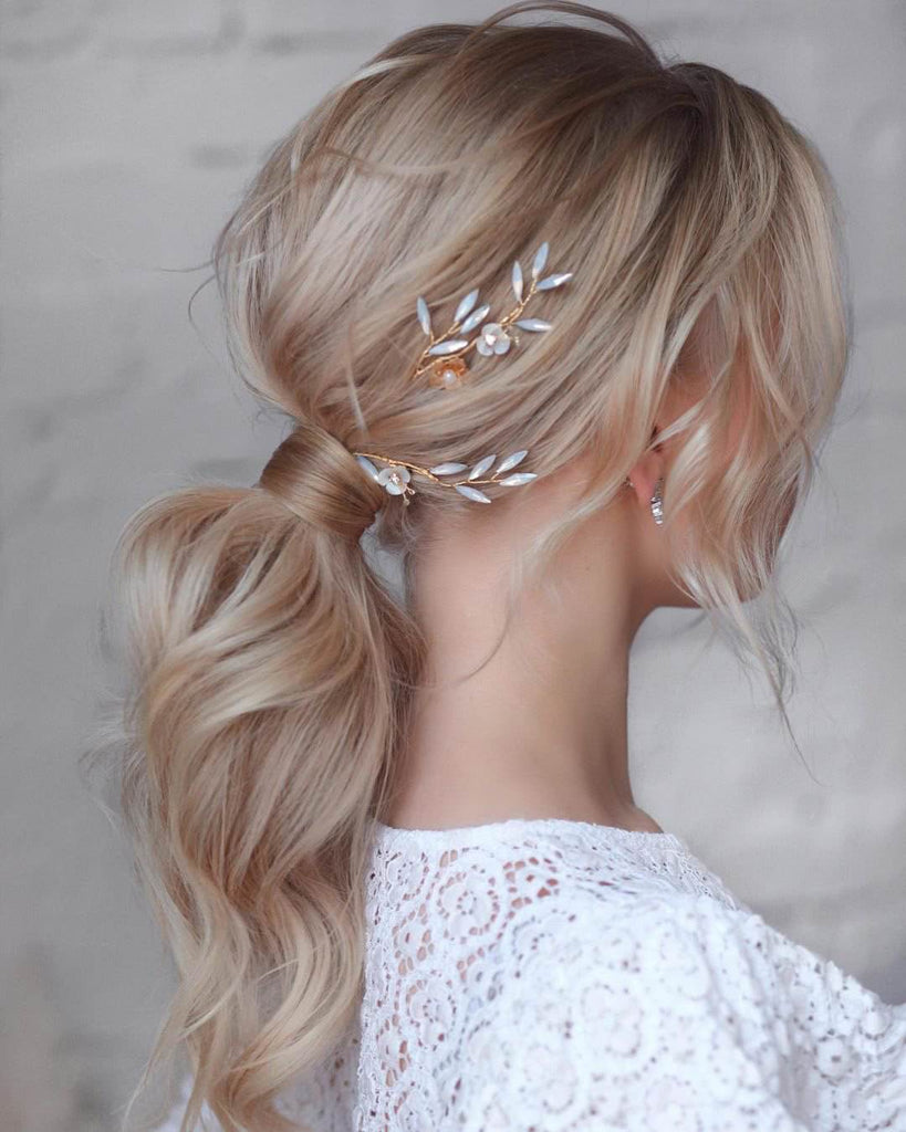 Low textured pony … | Bridesmaid hair ponytail, Ponytail bridal hair, Low ponytail  hairstyles