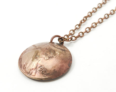 back of enameled penny charm necklace