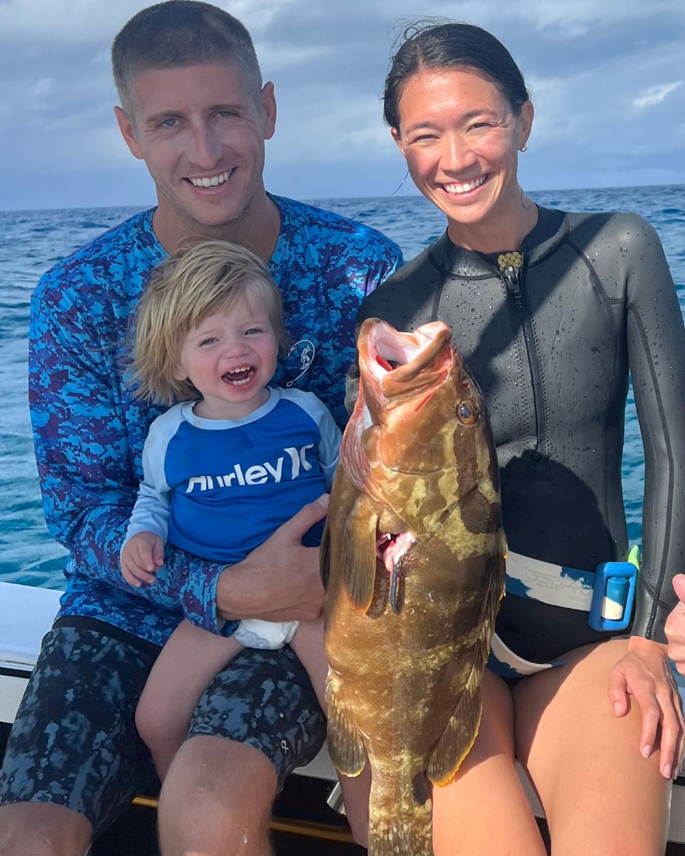 alli and family with fish