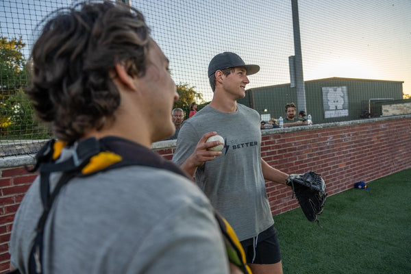 BRUCE BOLT athletes prepared to begin a baseball throwing drill.