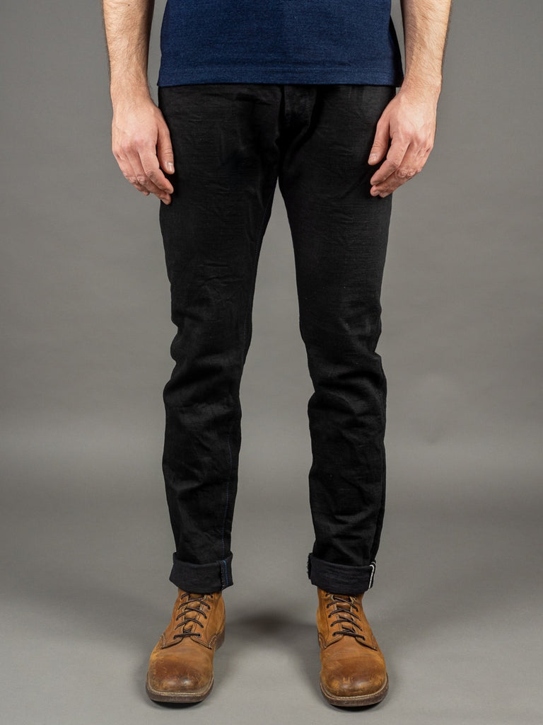 black tapered jeans