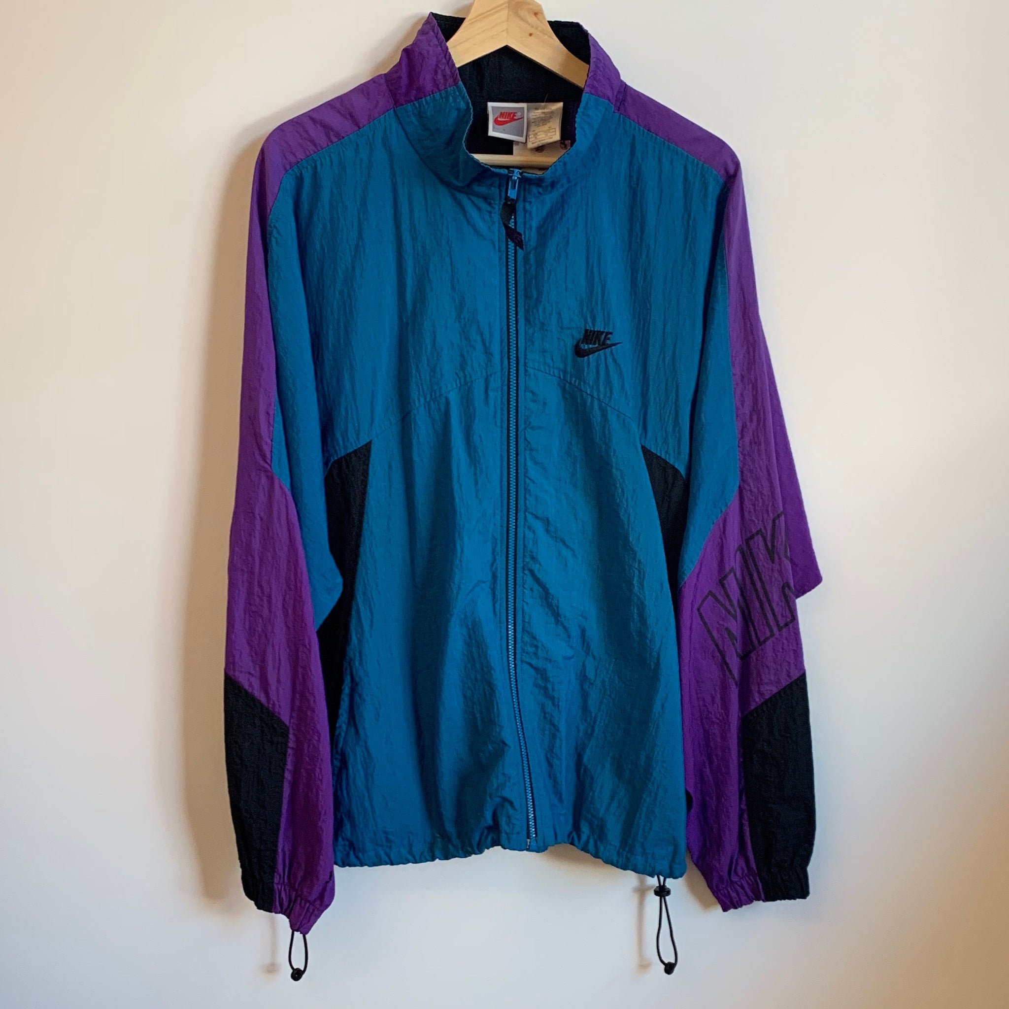 purple and black nike jacket