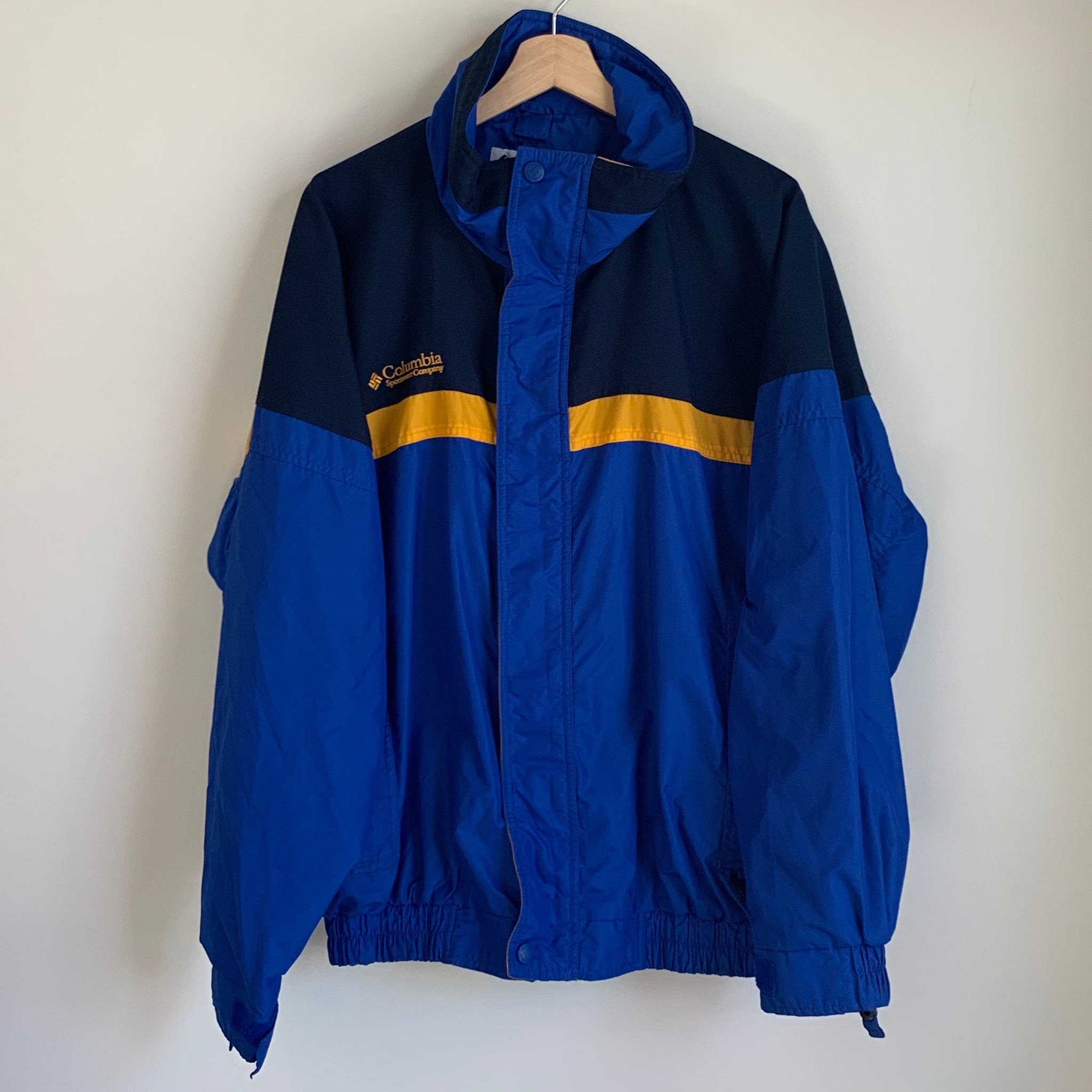 blue and yellow columbia jacket