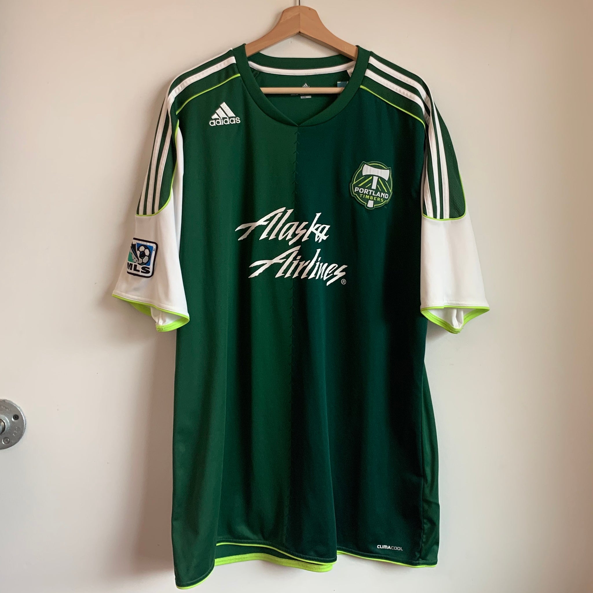 green and white soccer jersey